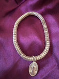 Gold-Colour Stretch Bracelet with Saint Charm